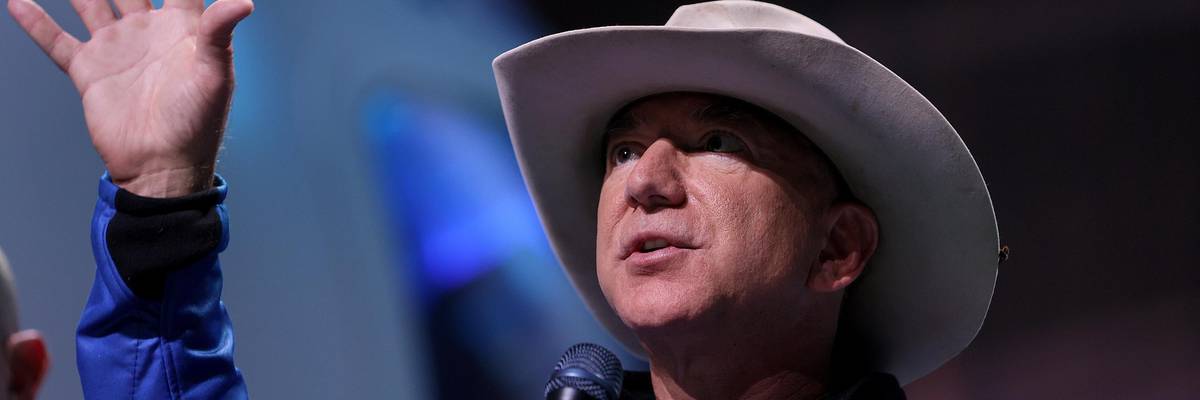 Jeff Bezos speaks to the media