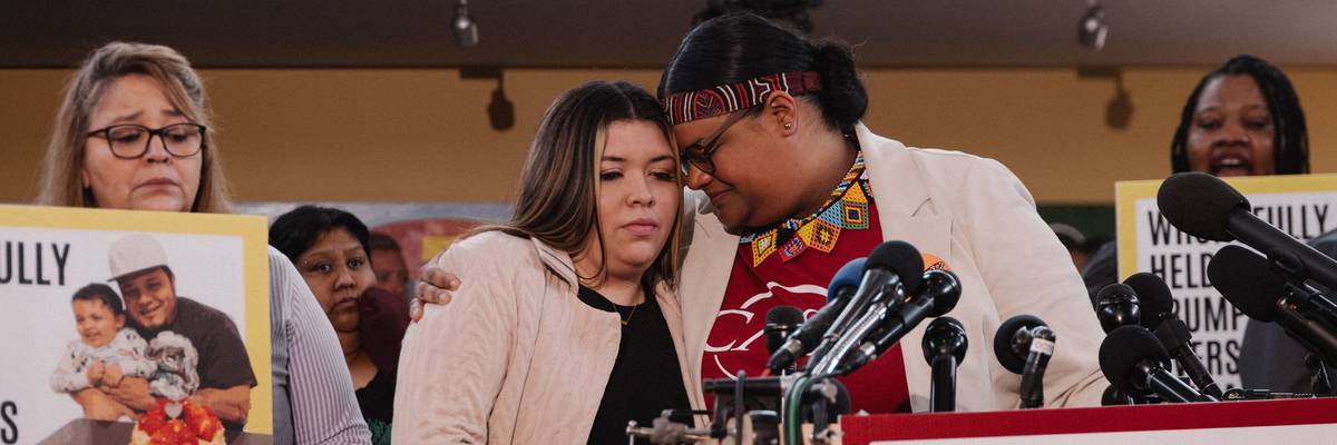 Jennifer Vasquez Sura, center, whose husband Kilmar Abrego Garcia was sent to El Salvador by the Trump administration, is hugged by a rights advocate