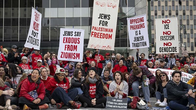 Jewish activists hold a Passover Seder outside ICE Headquarters In New York