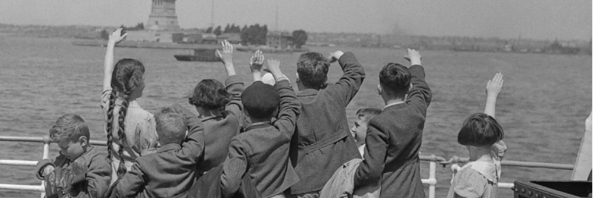 Jewish Austrian, part of a group of 50 fleeing the Nazis, wave to the Statue of Liberty as they arrive in America