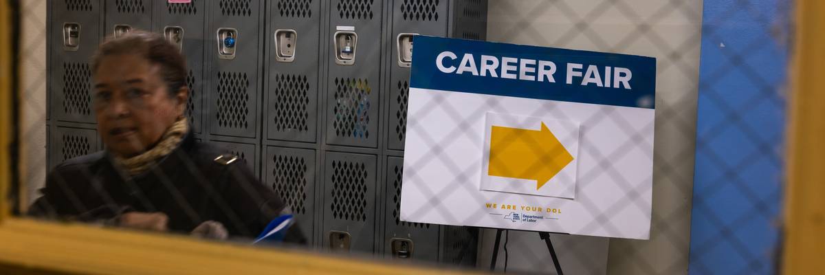 Job seekers attend a career fair