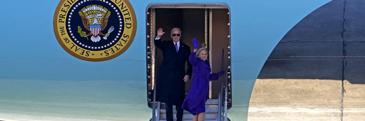 Joe and Jill Biden wave goodbye.