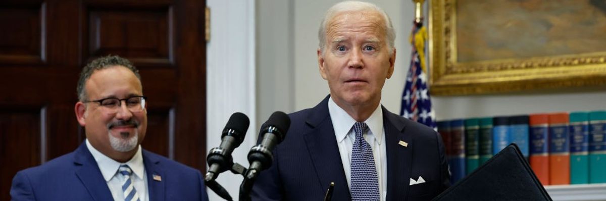 Joe Biden and Education Secretary Miguel Cardona