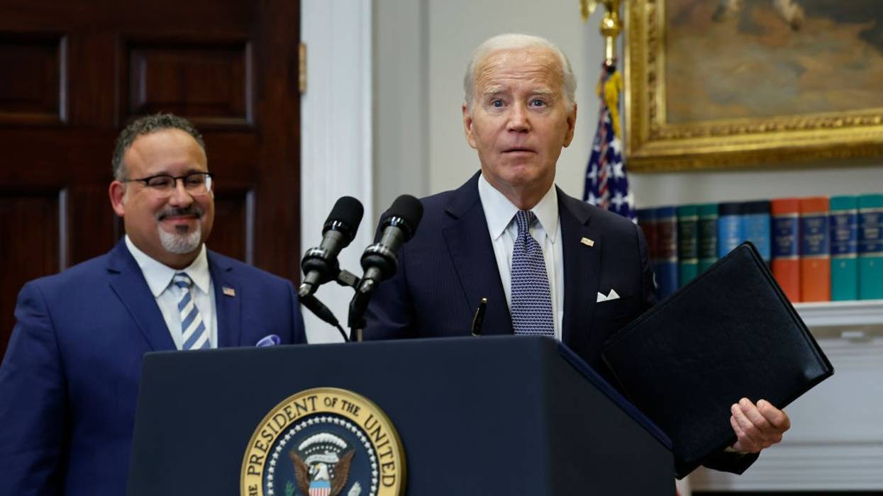 Joe Biden and Education Secretary Miguel Cardona