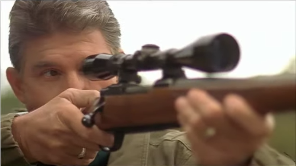 Joe Manchin with rifle