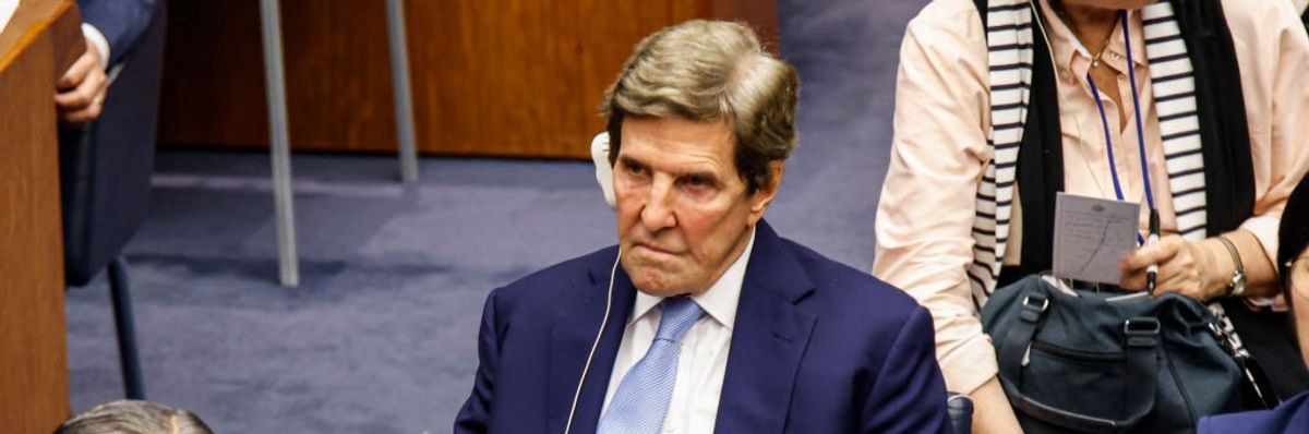 John Kerry grimaces at the Climate Ambition Summit.