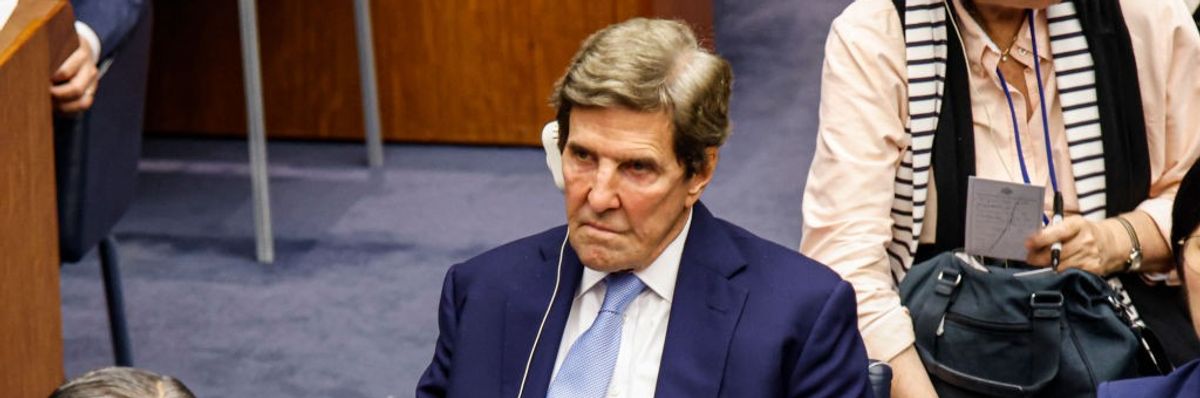 John Kerry grimaces at the Climate Ambition Summit. 