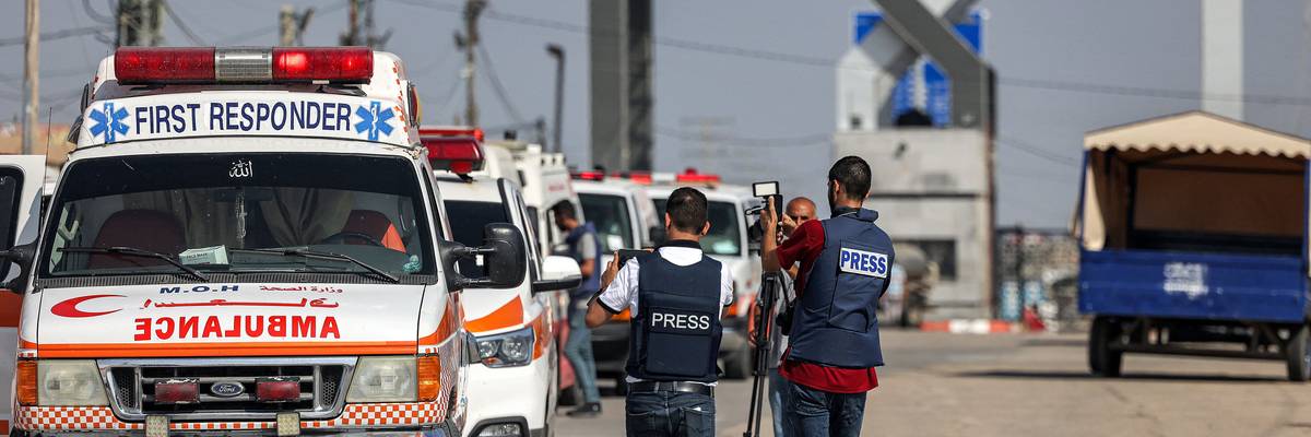Journalists film as Palestinian ambulances