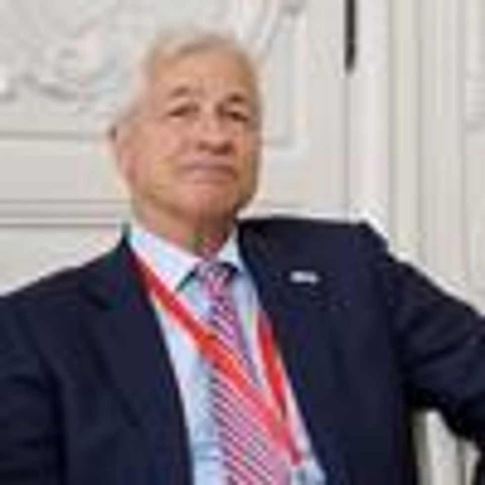 JPMorgan Chase CEO Jamie Dimon looks on during a meeting