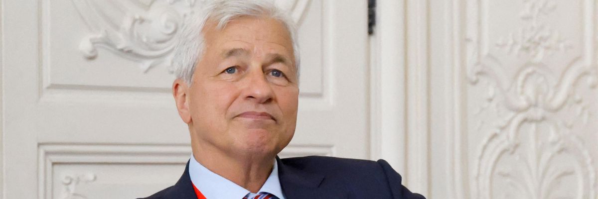JPMorgan Chase CEO Jamie Dimon looks on during a meeting