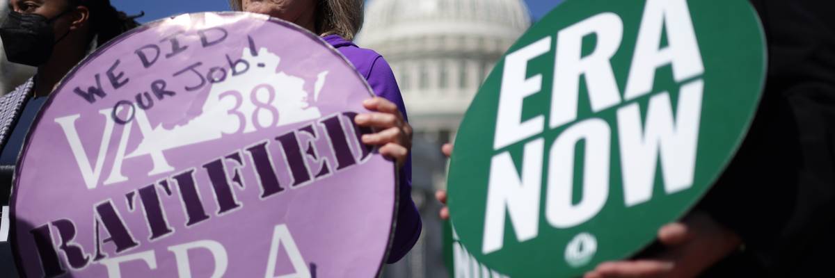 Juli Briskman (2nd R), Algonkian District Supervisor of Loudoun County in Virginia, and Shannon Fisher (R) of the National Organization for Women listen during a news conference near the U.S. Capitol on September 28, 2022.