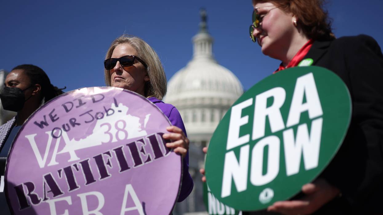 Juli Briskman (2nd R), Algonkian District Supervisor of Loudoun County in Virginia, and Shannon Fisher (R) of the National Organization for Women listen during a news conference near the U.S. Capitol on September 28, 2022.