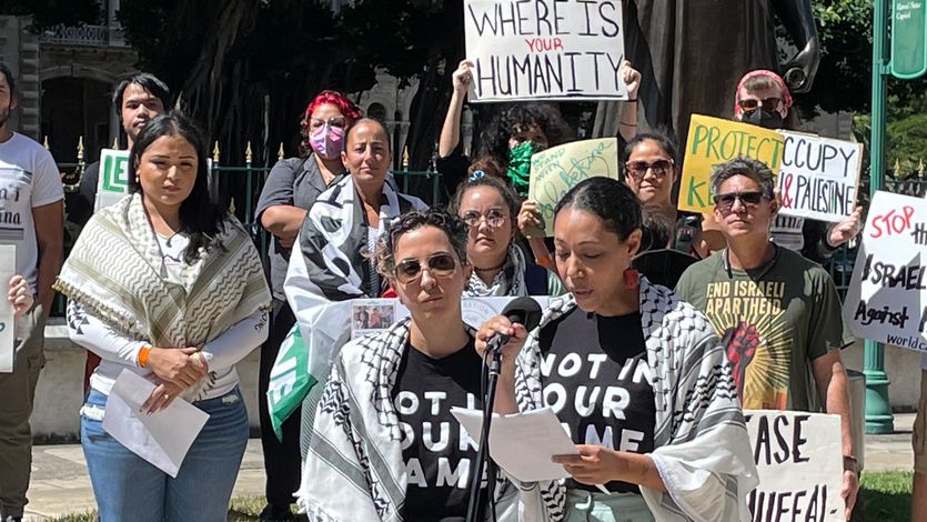 JVP reps speaking at a press conference in Hawaii.