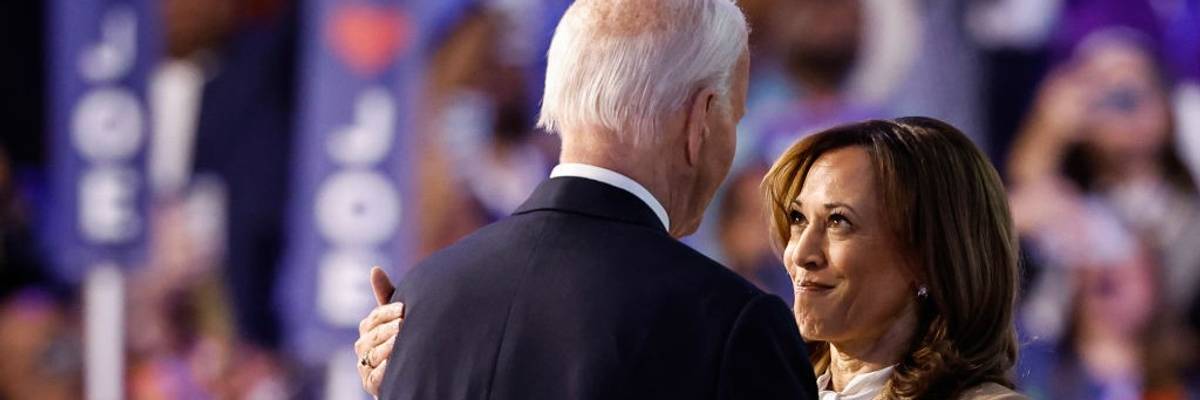 Kamala Harris and Joe Biden embrace at DNC