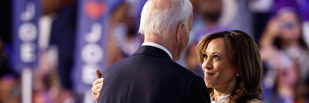 Kamala Harris and Joe Biden embrace at DNC