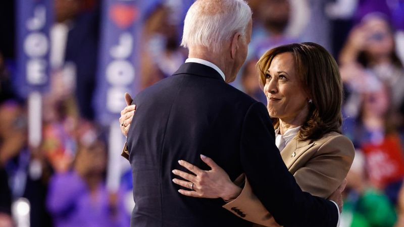 Kamala Harris and Joe Biden embrace at DNC