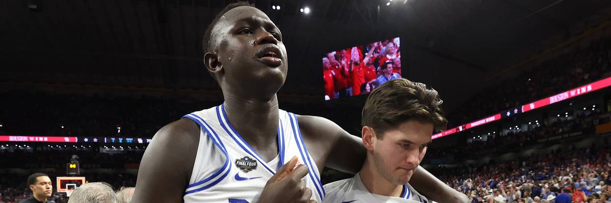 Khaman Maluach and teammate