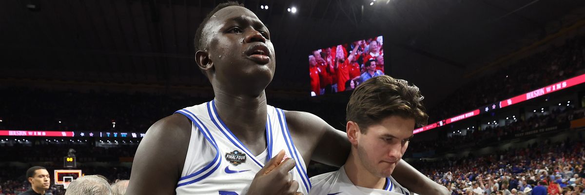 Khaman Maluach and teammate