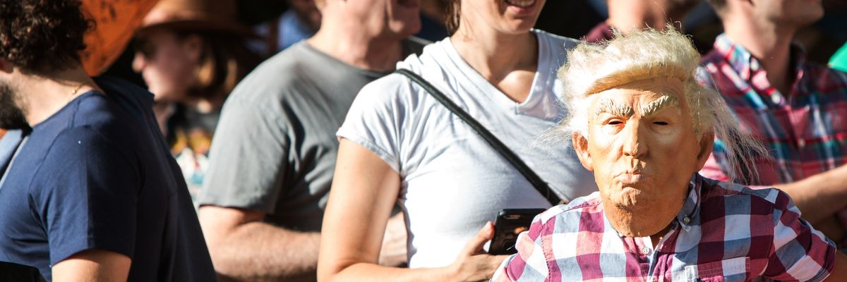 Kid Wears Donald Trump Mask At Popular Atlanta Halloween Parade
