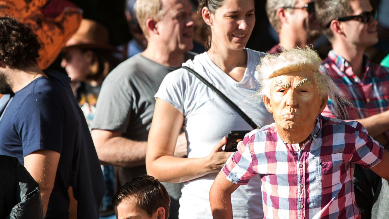 Kid Wears Donald Trump Mask At Popular Atlanta Halloween Parade
