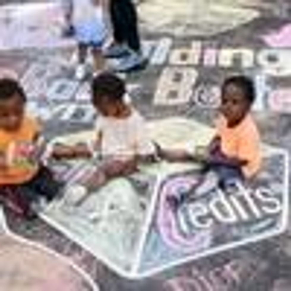 Kids draw at a playground in Washington, D.C.