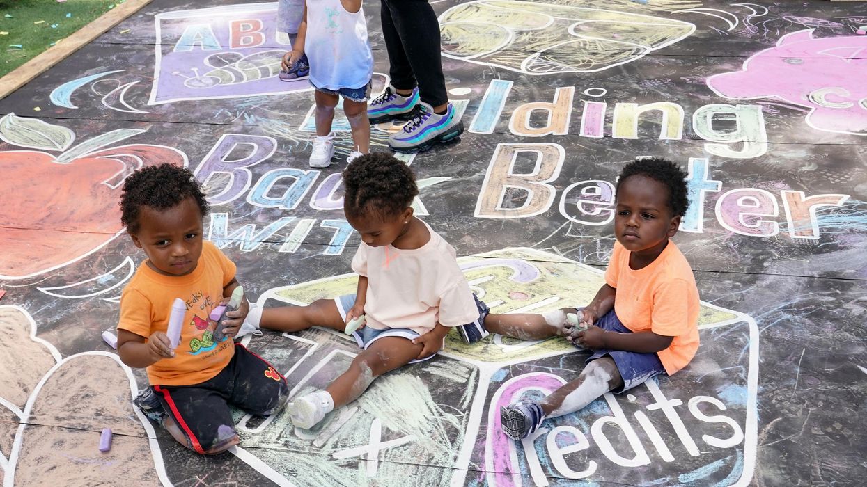 Kids draw at a playground in Washington, D.C.