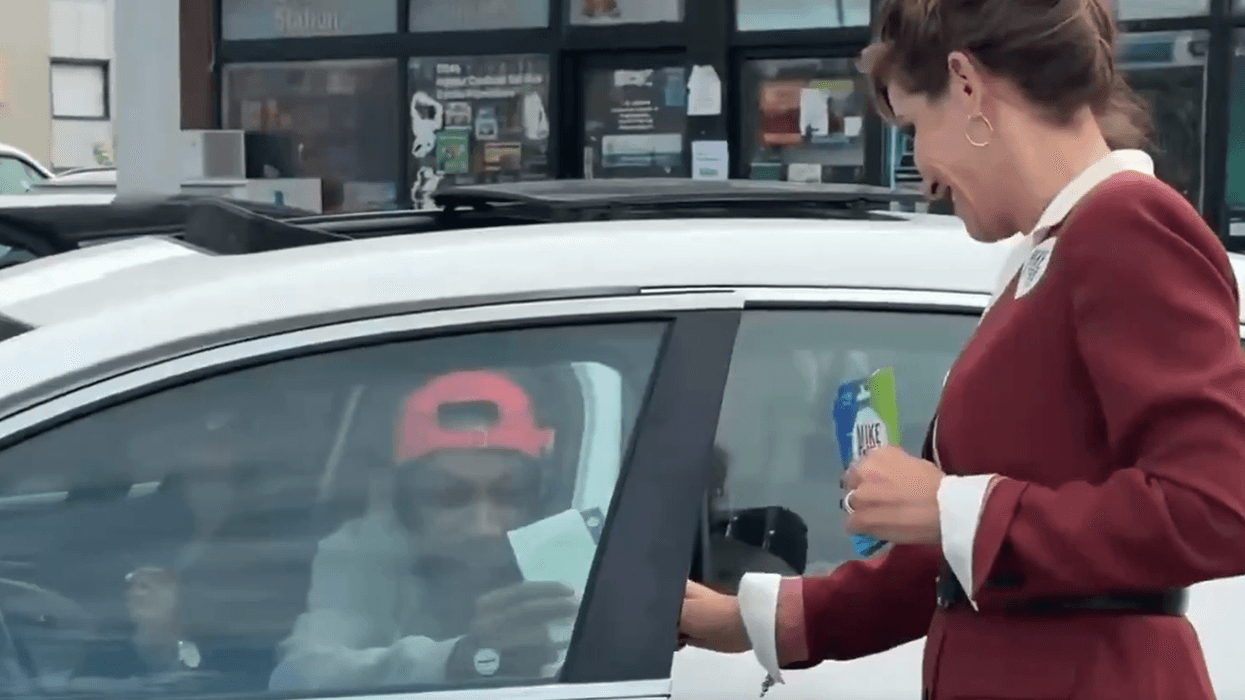 Mike Rogers' Wife Hands Out $10 Gas Cards, Begging Michiganders to Vote for Her Husband