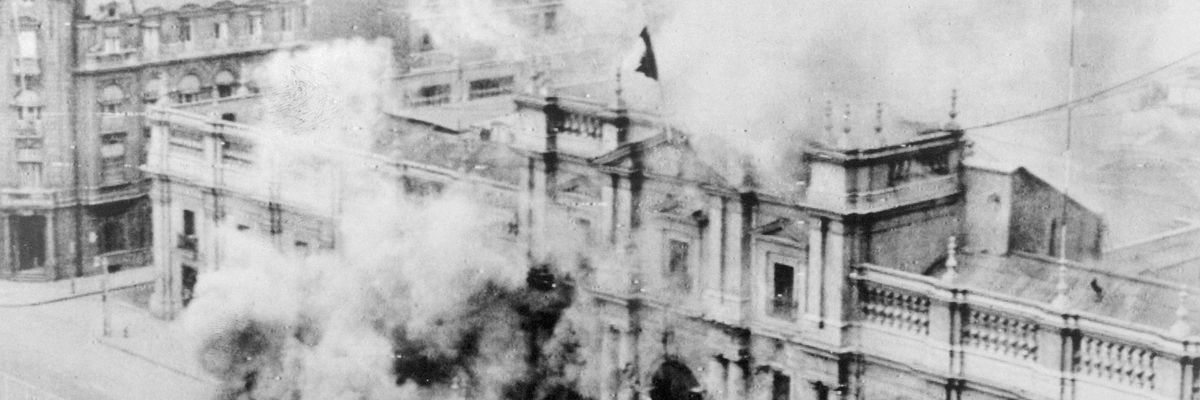 La Moneda, Chile's presidential palace in Santiago, is bombed by the nation's armed forces on September 11, 1973. Salvador Allende, the country's democratically elected socialist president, died during the U.S.-backed coup that brought to power Augusto Pinochet, who imposed neoliberalism through military dictatorship. (Photo: Bettmann via Getty Images)