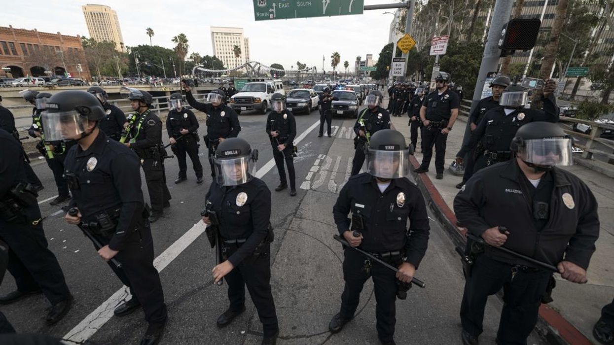 LA Police Officers with batons drawn