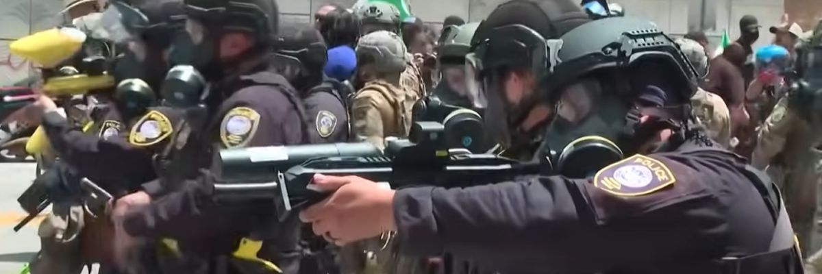 LAPD advance with guns and tear gas against L.A. protesters