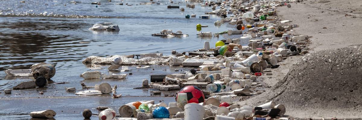 Large amounts of trash and plastic refuse collect in Ballona Creek after first major rain storm, Culver City, California