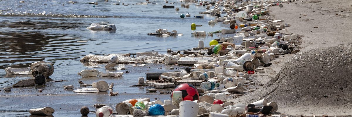 Large amounts of trash and plastic refuse collect in Ballona Creek after first major rain storm, Culver City, California