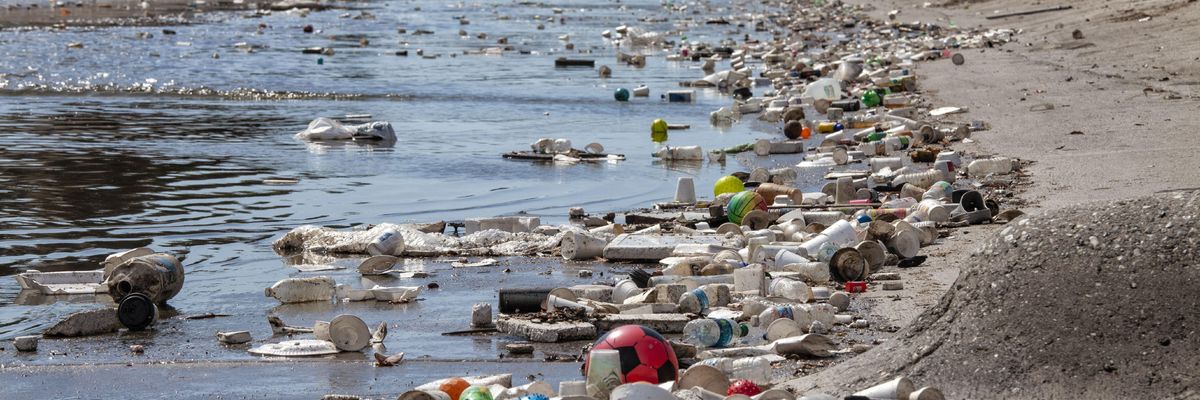 Large amounts of trash and plastic refuse collect in Ballona Creek after first major rain storm, Culver City, California