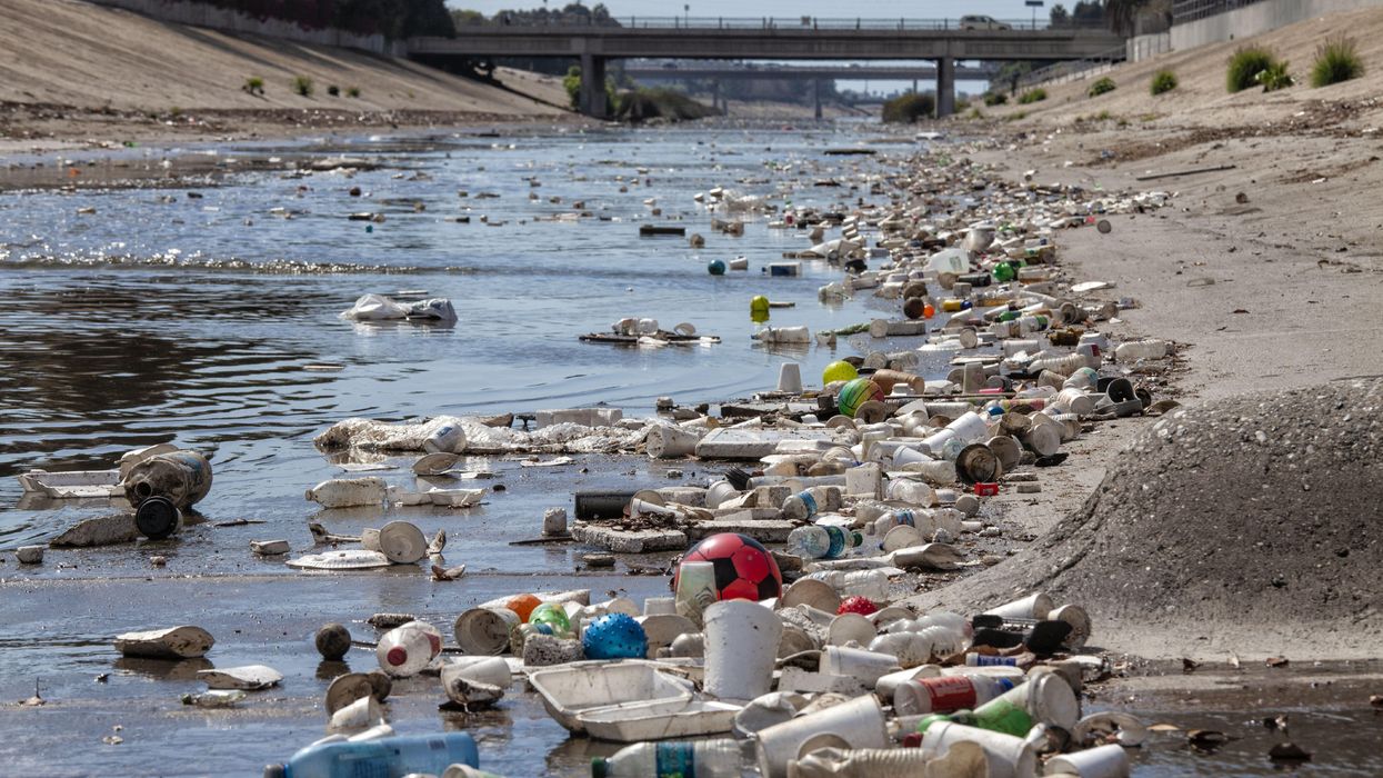 Large amounts of trash and plastic refuse collect in Ballona Creek after first major rain storm, Culver City, California