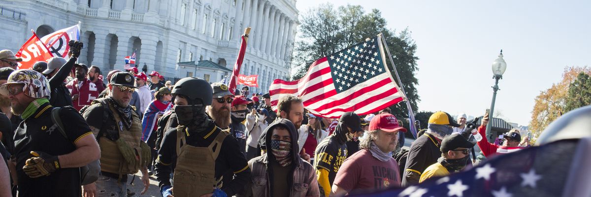 Large groups of Proud Boys join tens of thousands of Trump supporters
