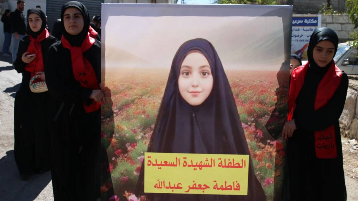 Lebanese women mourn the death of 9-year-old Fatima Abdullah