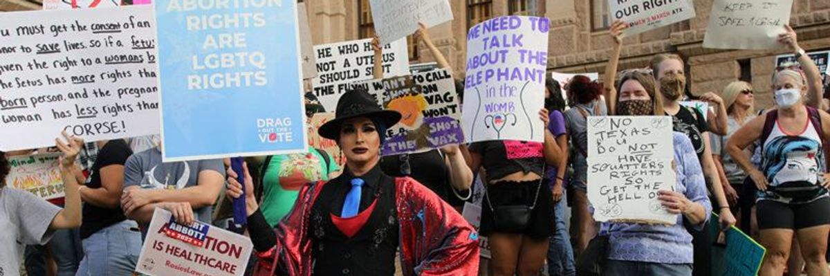 LGBTQ activists marching for reproductive rights.