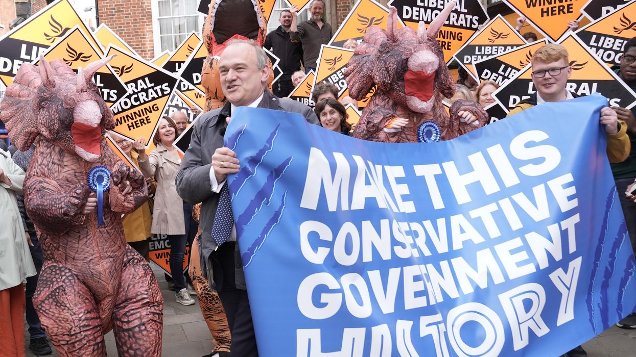 Liberal Democrat leader Sir Ed Davey is greeted by Tory "dinosaurs"