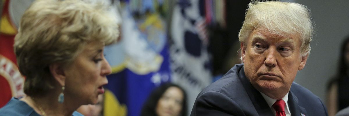 Linda McMahon and Trump.