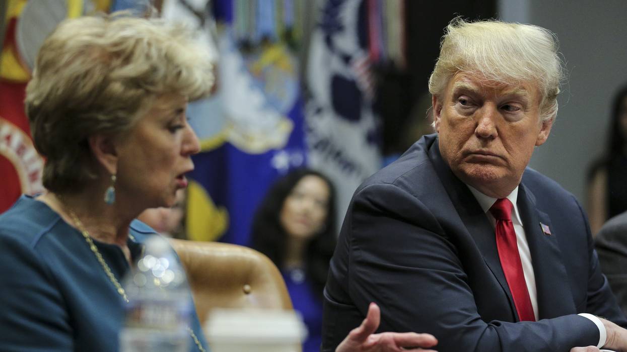 Linda McMahon and Trump.
