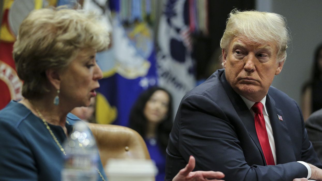 Linda McMahon and Trump.