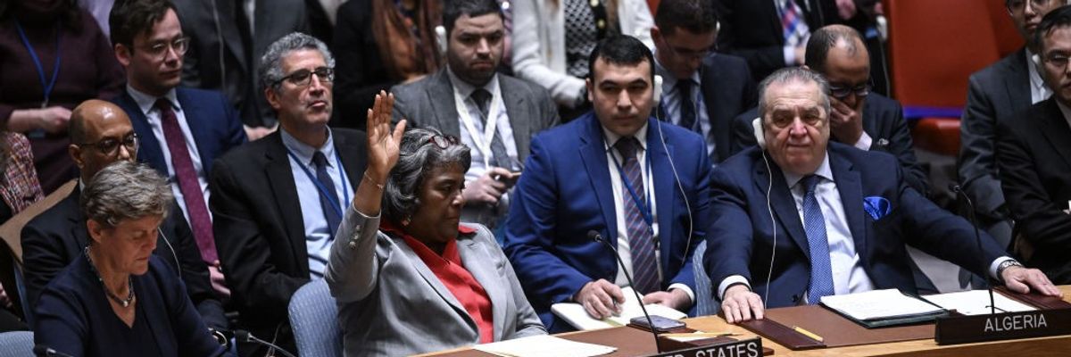 Linda Thomas-Greenfield raises her hand to abstain