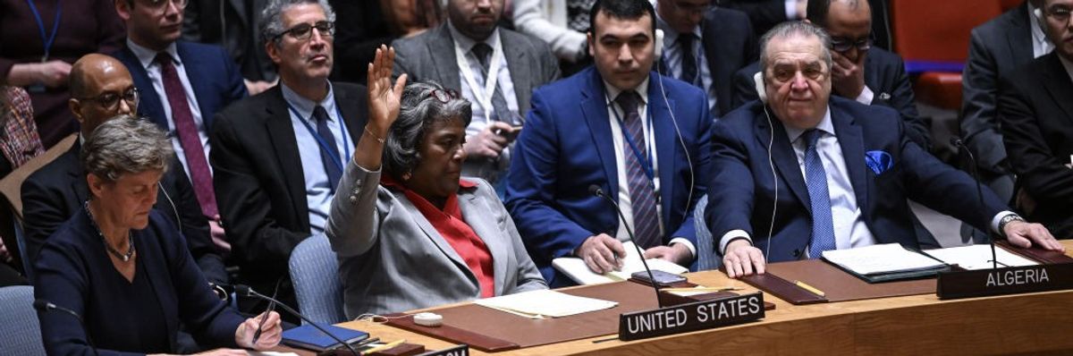 Linda Thomas-Greenfield raises her hand to abstain