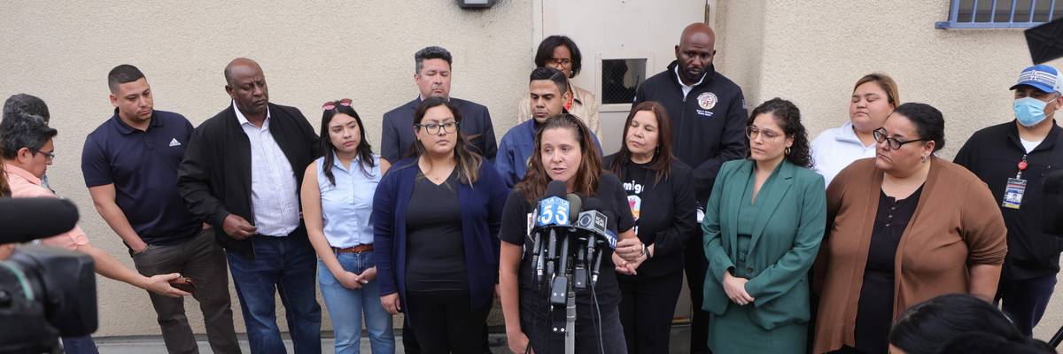 Lindsay Toczylowski, executive director of the Immigrant Defenders Law Center, speaks to the media outside a Los Angeles church where migrants were transported on June 14, 2023.
