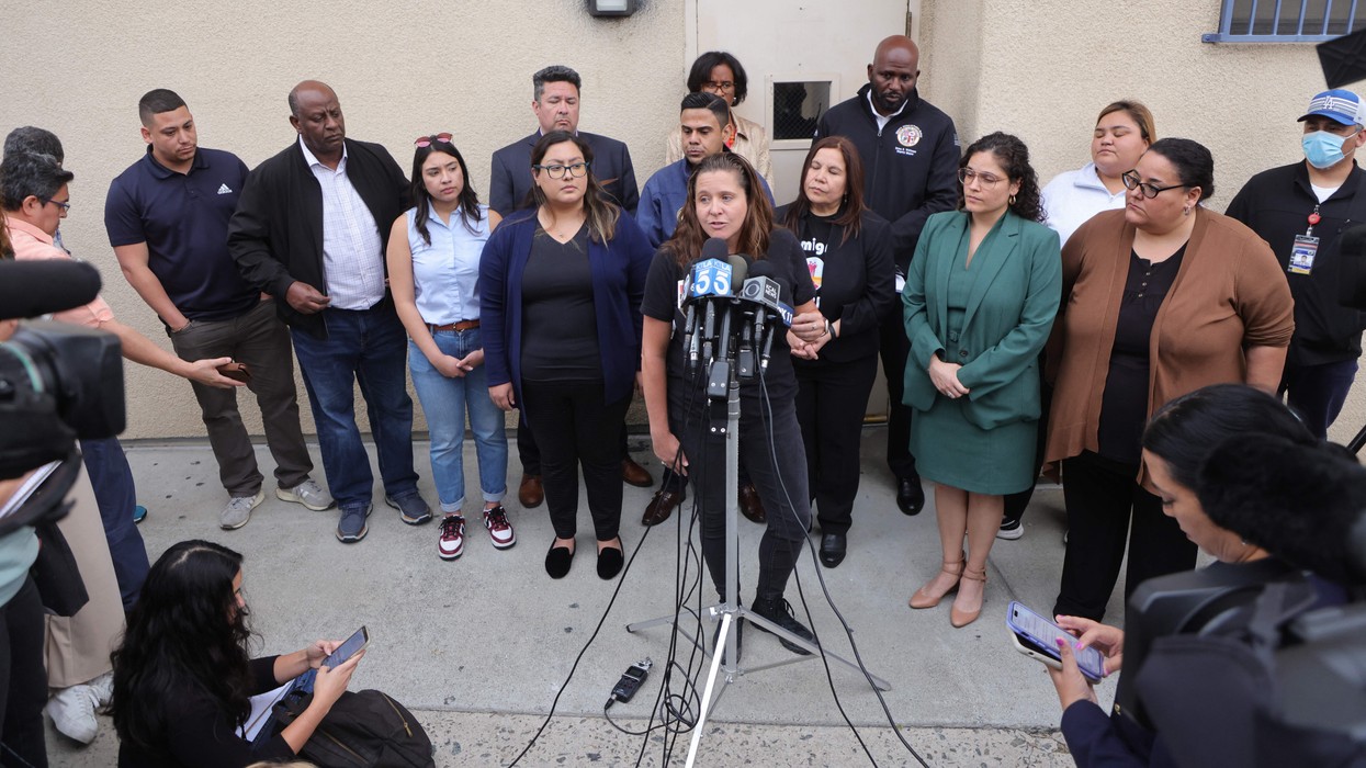 Lindsay Toczylowski, executive director of the Immigrant Defenders Law Center, speaks to the media outside a Los Angeles church where migrants were transported on June 14, 2023.