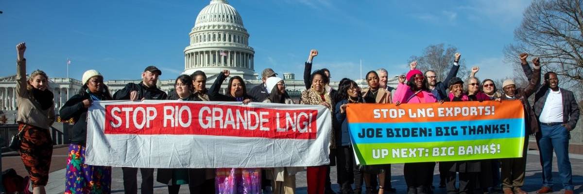 LNG protesters hold banners in Washington, D.C.