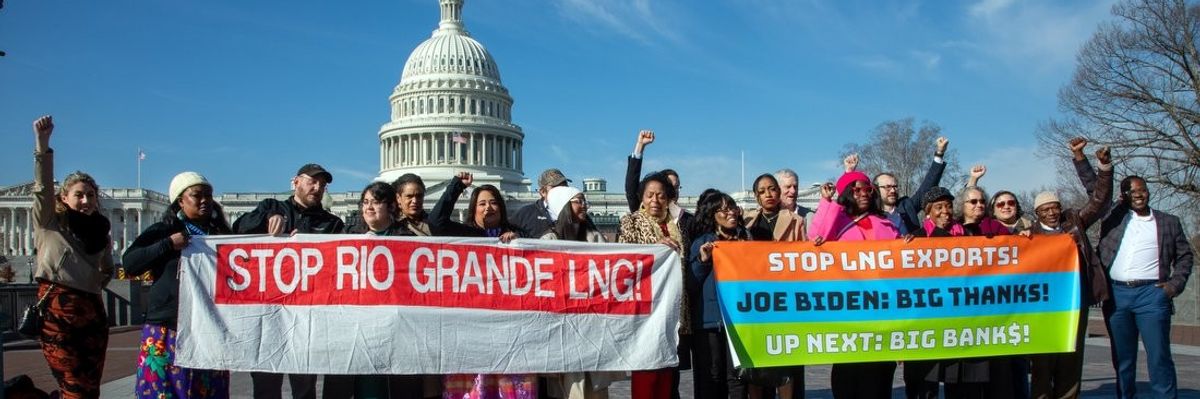 LNG protesters hold banners in Washington, D.C.