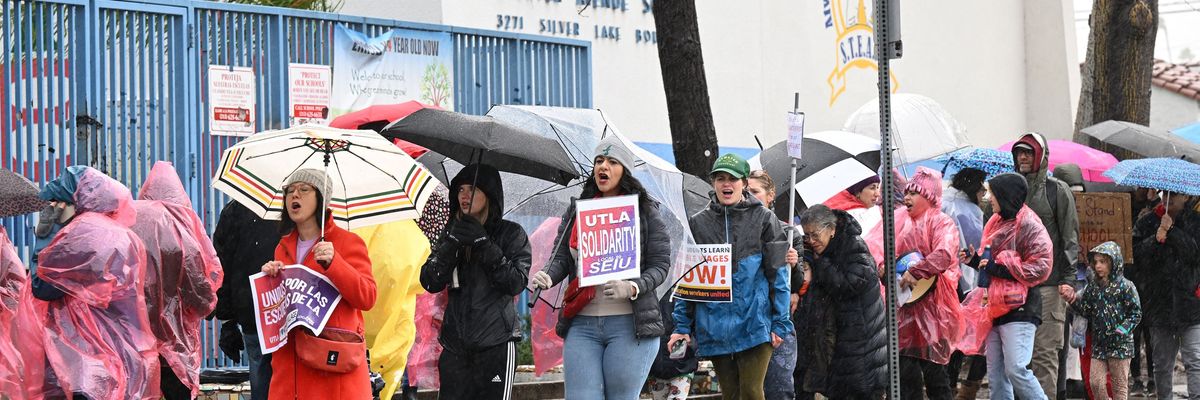 Los Angeles public school support workers, teachers, and supporters walk the picket line