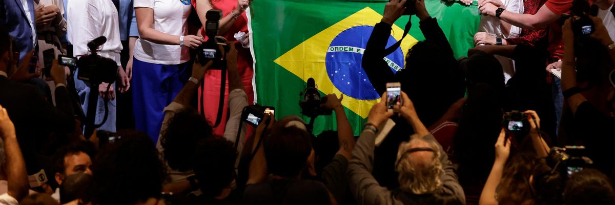 Lula celebrates with supporters after winning Brazil's presidential election