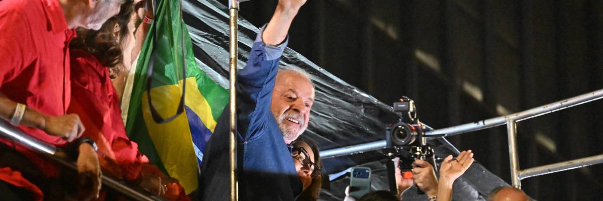 Lula waves to supporters after winning reelection